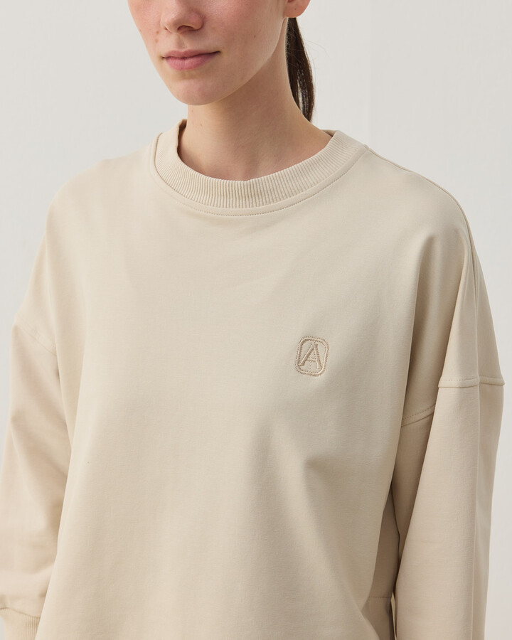 İki İplik Yırtmaçlı Sweat Bluz Krem